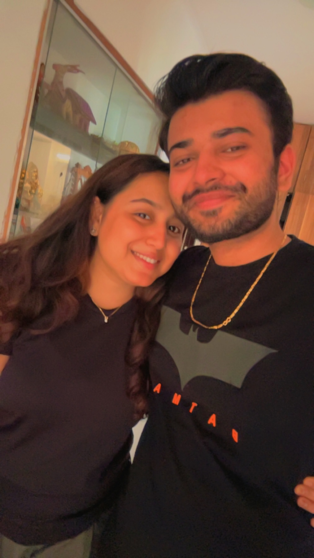 Us dressed up and smiling together